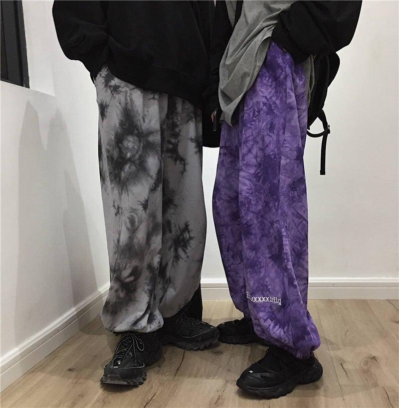 Letter-embroidered tie-dye trousers